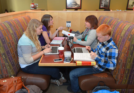 Students studying in The Hub