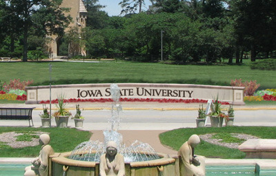 cropped image of low wall with "Iowa State University" engraved 