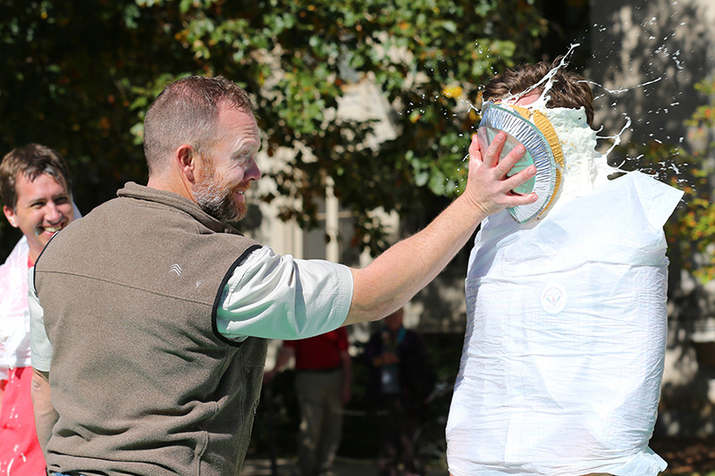 Faculty participate in Pie in the Face fundraiser.