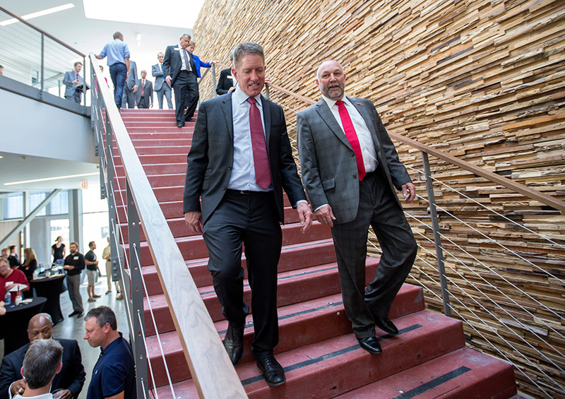 Bruce Rastetter and Steven Leath on the stairs of the Economic D