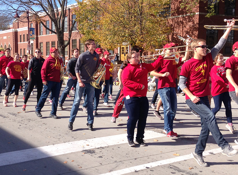 Cyclone band members march near city hall
