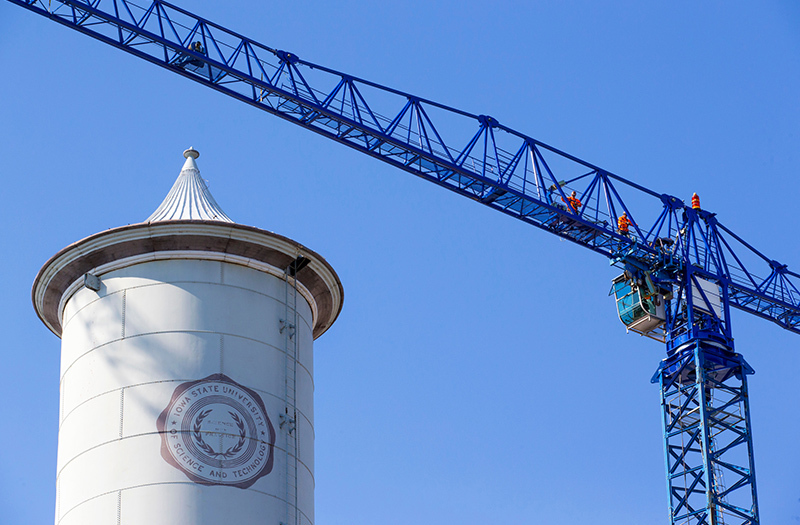 Jib on tower crane rises above Marston water tower