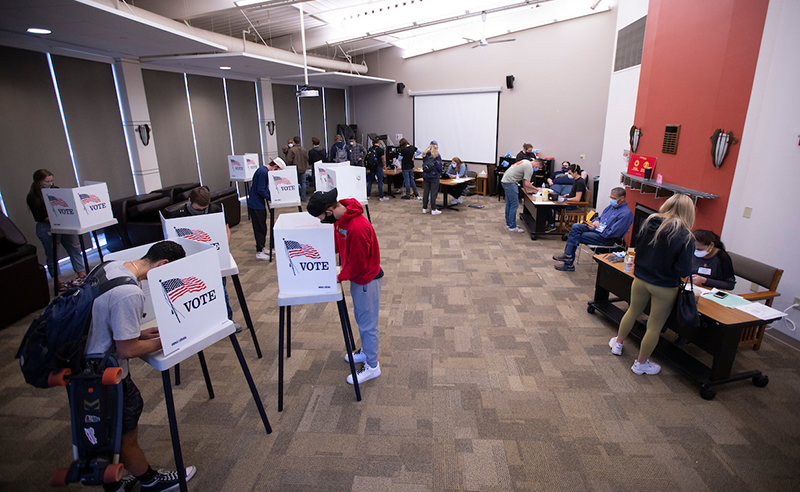 Students vote at campus polling location in Buchanan Hall