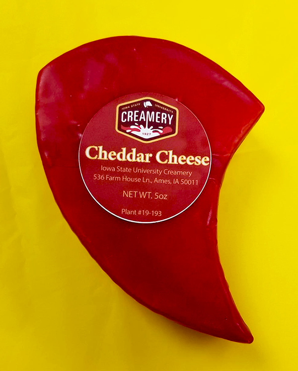 red-wrapped cheese in a cyclone shape
