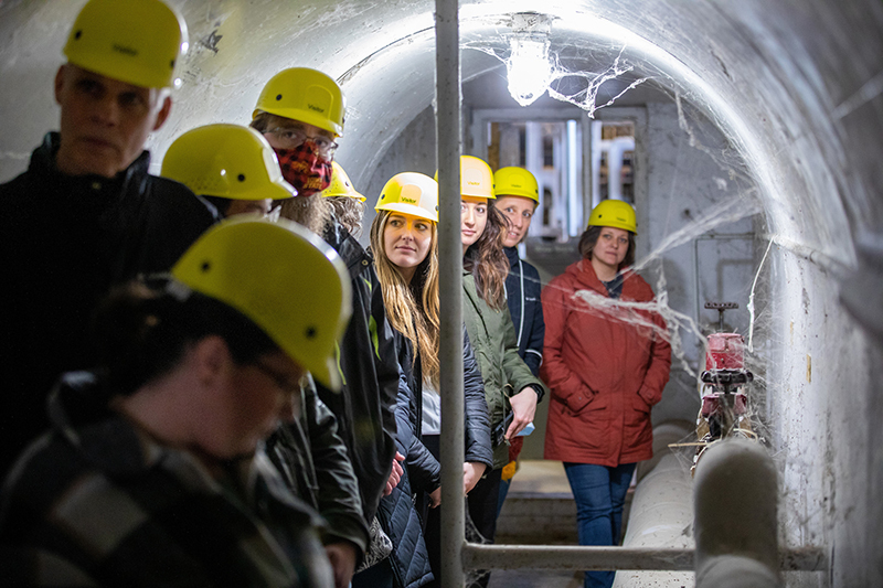 Faculty and staff on the steam tunnel tour
