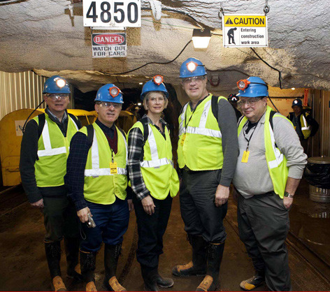 Eli Rosenberg and other physics leaders in a South Dakota mine