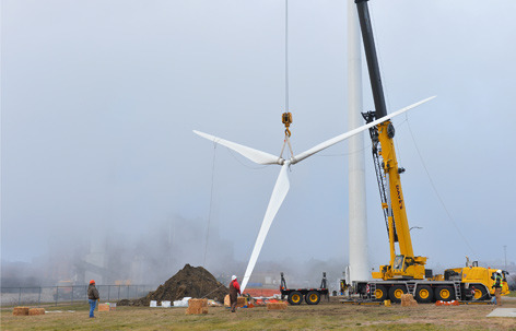 Wind turbine hoisted into place