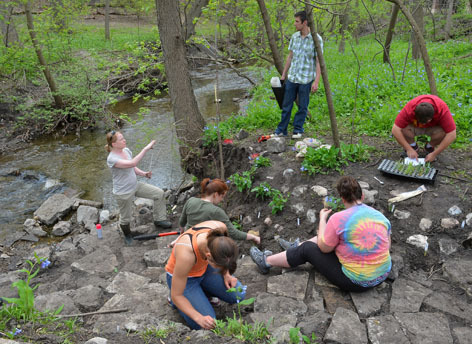 Landscape architecture students work near College Creek