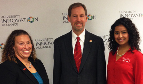 Provost Jonathan Wickert, doctoral student Angie Mallory (left),