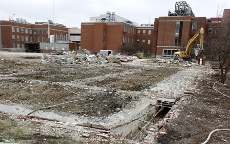 Workers sort demo materials at former Davidson Hall site