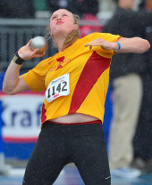 Christina Hillman throwing the shot put.