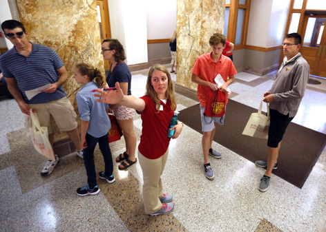 ISU student gives directions to prospective students and parents