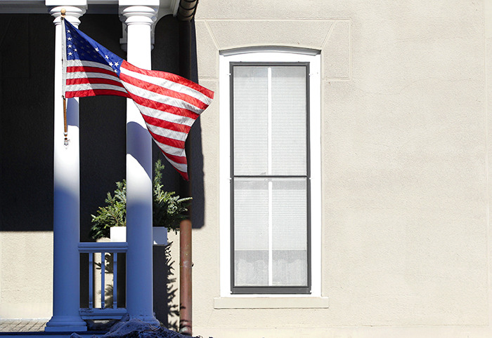 Flag outside the Farmhouse Museum.