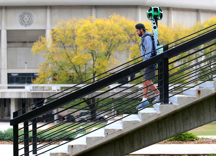 Google Maps employee with backpack-mounted video recorder