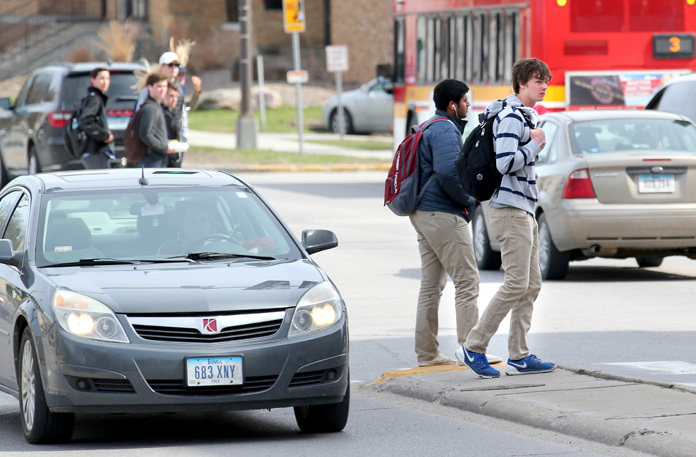 Pedestrians, cars mingle along Lincoln Way