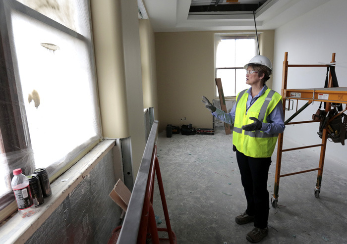 Project manager Kerry Dixon in a partially painted office