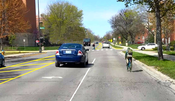 Yellow striping of road surface on Pammel Drive