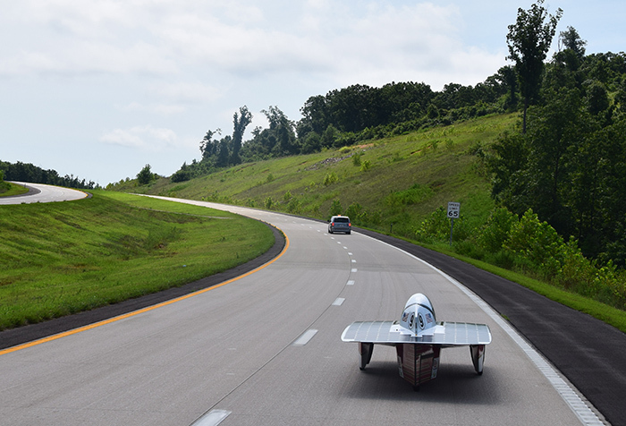 solar car trails a lead van