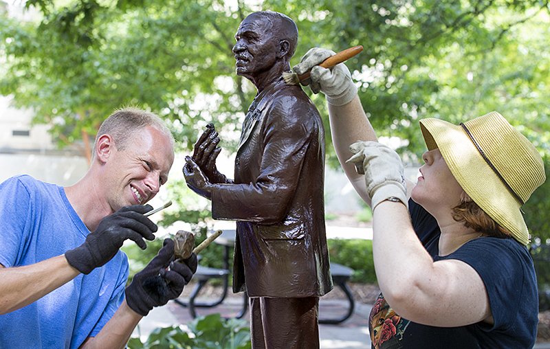 Conservation work on George Washington Carver statue.