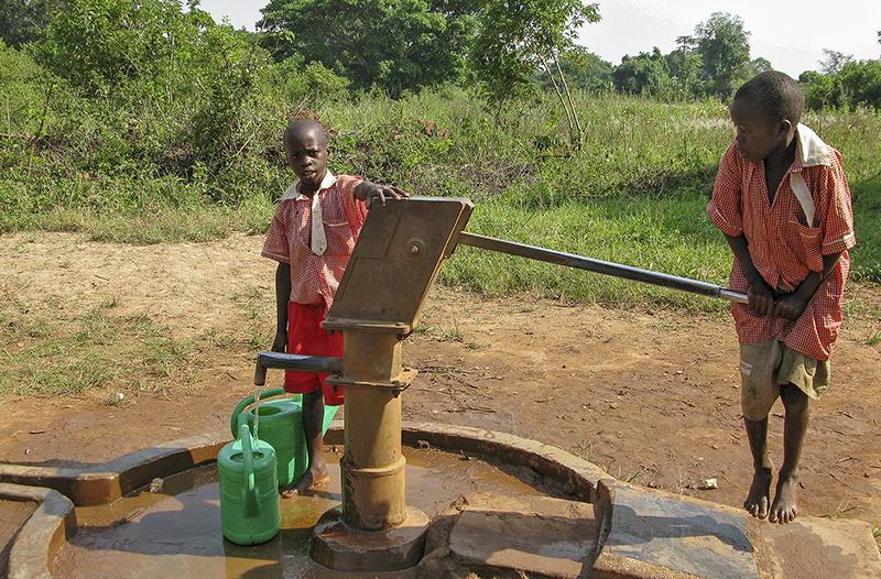 Kamuli youth at well