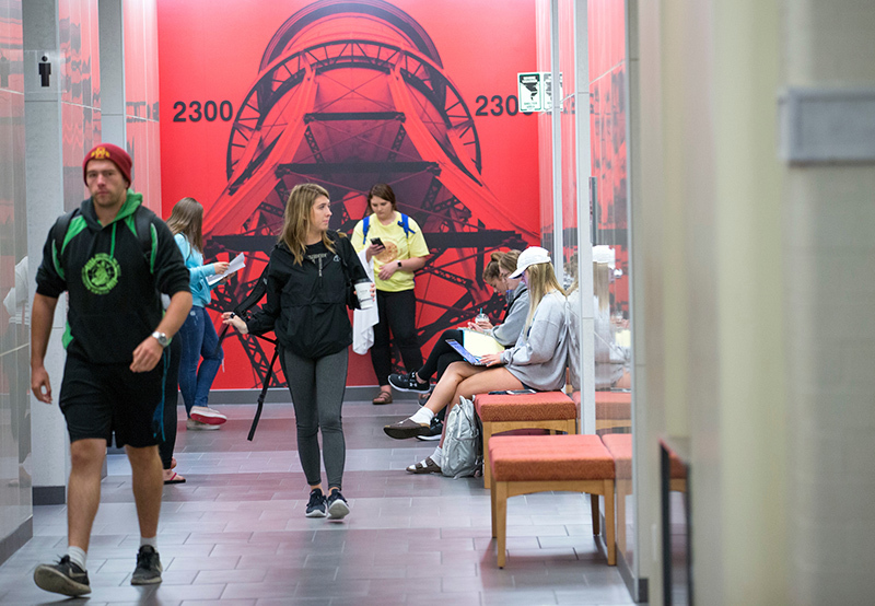 Students in the main hallway of Marston Hall