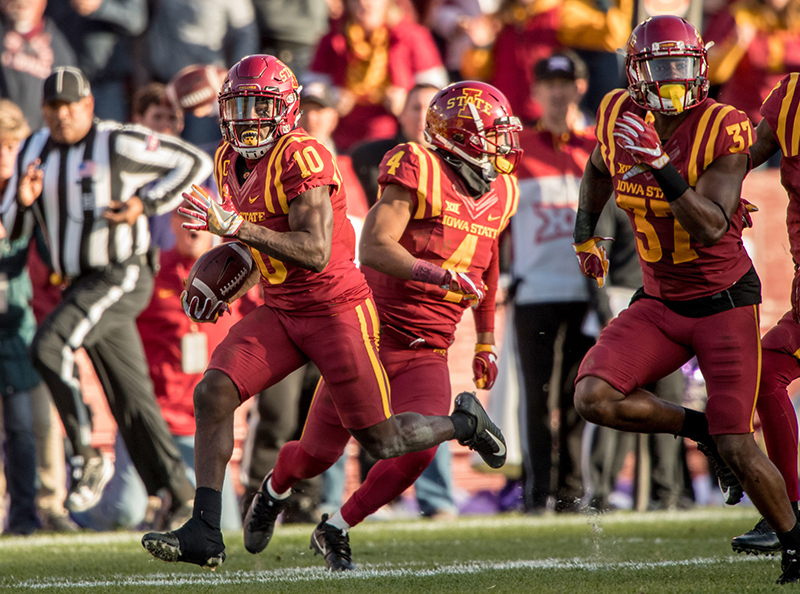 Defensive back Brian Peavy runs downfield after intercepting a T