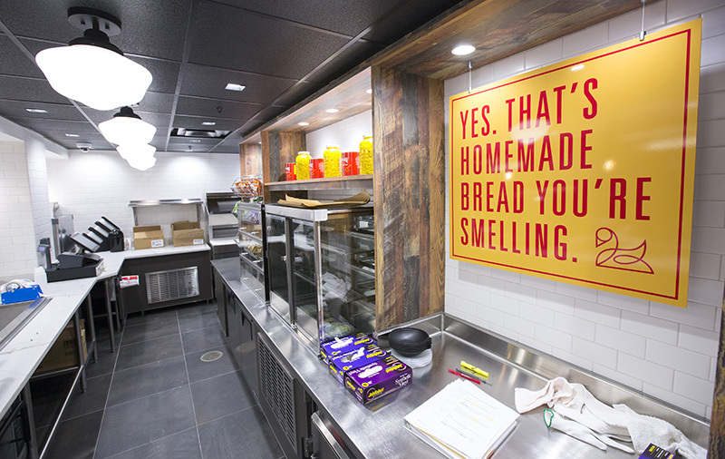 Behind the counter at Lance and Ellie's deli