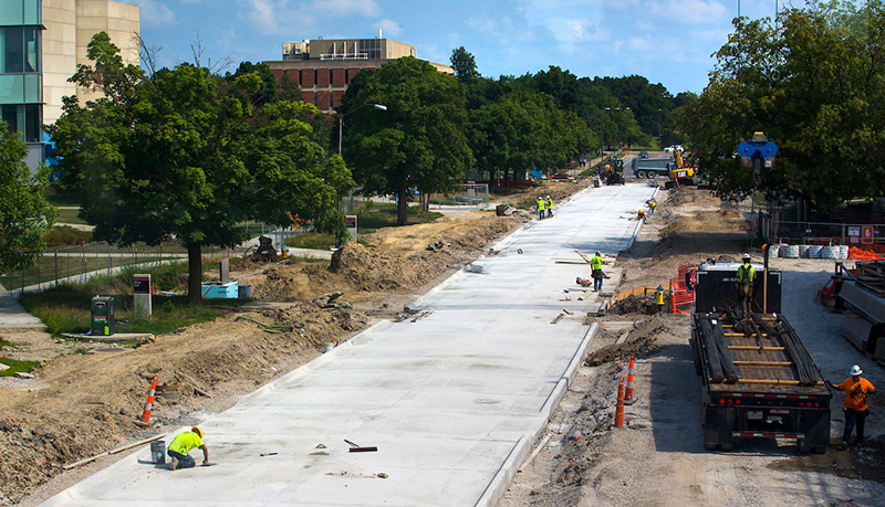 Crews work on a new Bissell Road surface