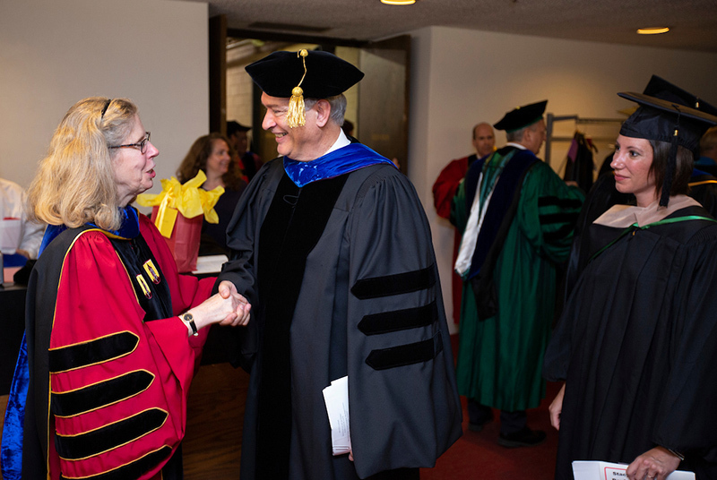 President Wendy Wintersteen, Faculty Senate president Peter Mart