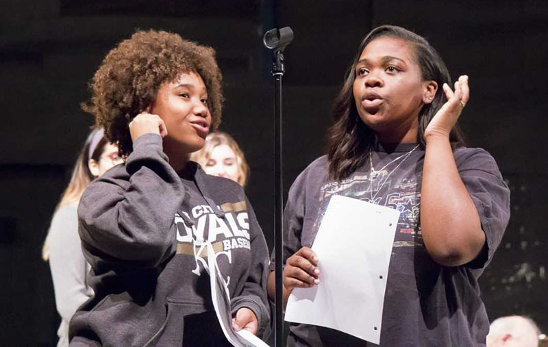 Two cast members rehearse for "It's a Wonderful Life: A Live Rad