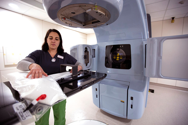 Drema Lopez demonstrates a linear accelerator