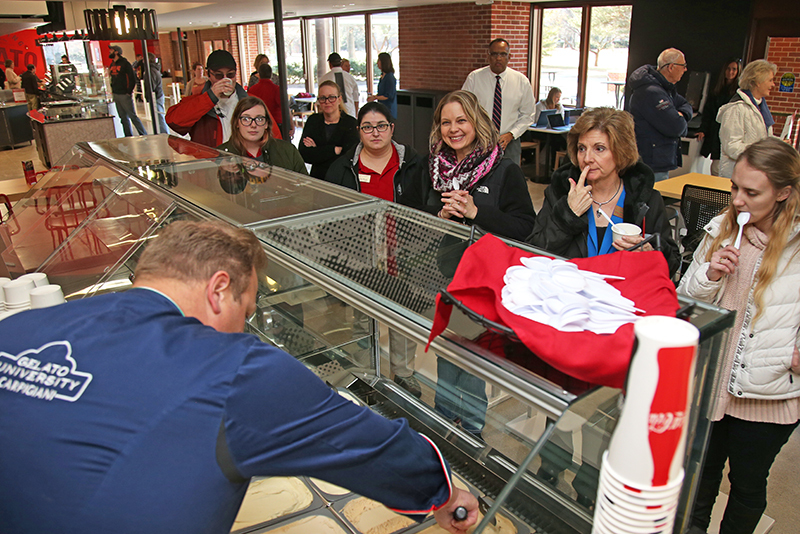 People line up for gelato samples at the Hub open house