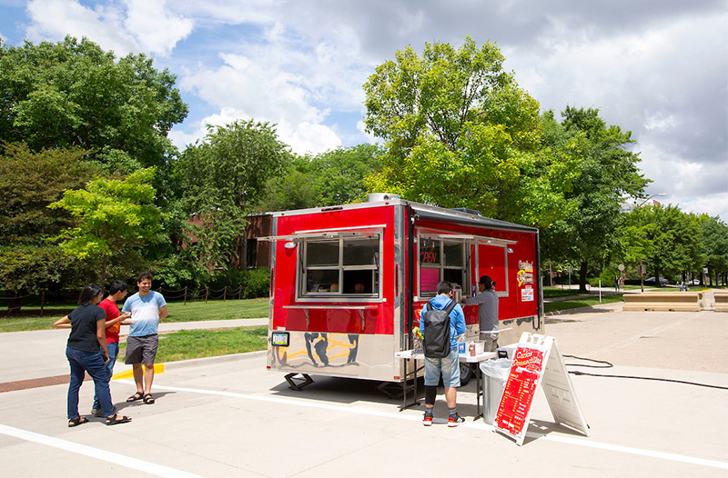 Carlos' Quesadillas food truck parks west of Kildee Hall