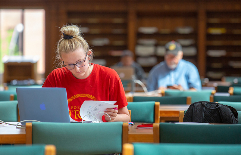 Female student studies in Parks Library