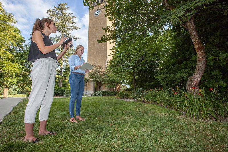 Students on campus using GIS to map trees