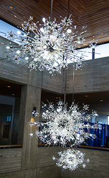 Three chandeliers in the Scheman central atrium