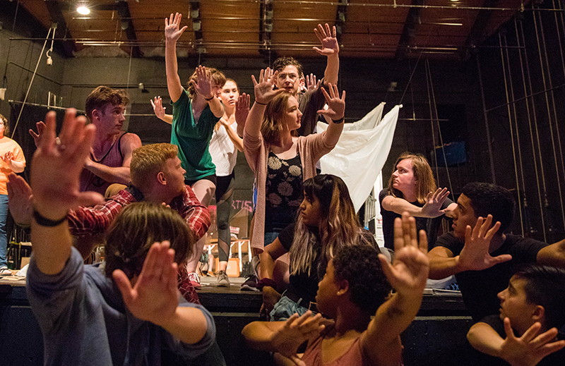 Theatre action cast during rehearsals