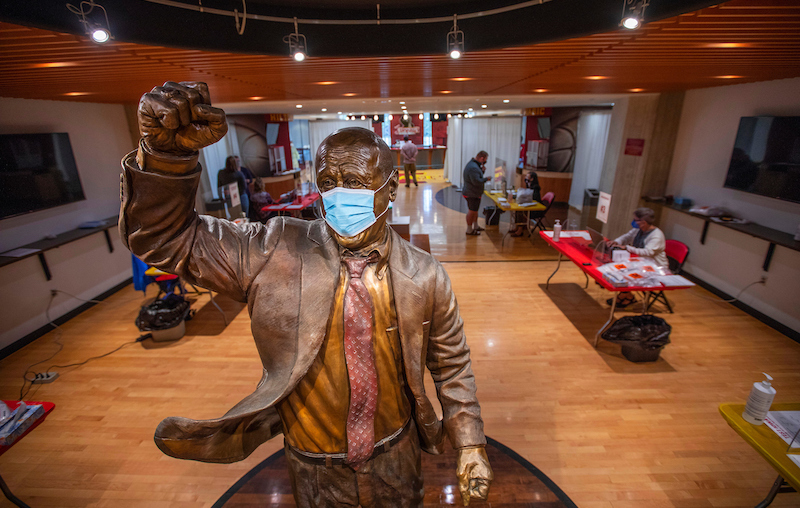 Bronze statue of Johnny Orr in the registration area of the test