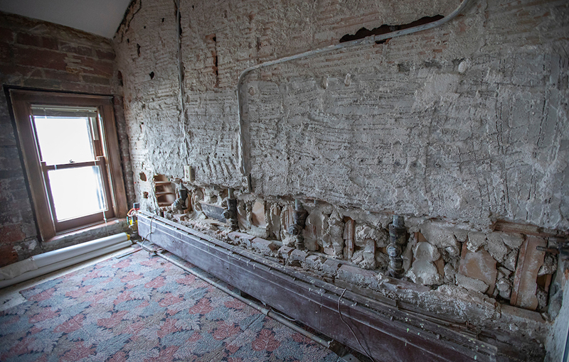 Plumbing remnants in a sixth floor wall of the Memorial Union