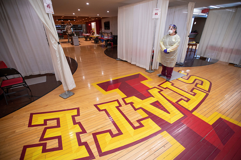 Health care worker stands ready at testing site in Johnny's