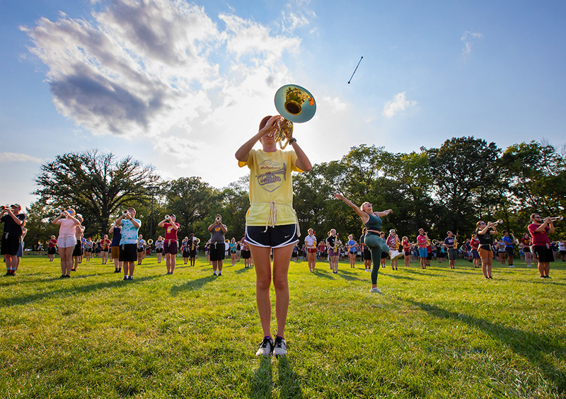 Female horn player solos for the marching band