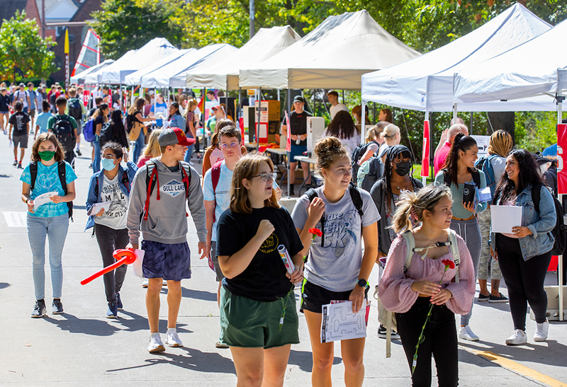 Students take in ClubFest at outdoor tents