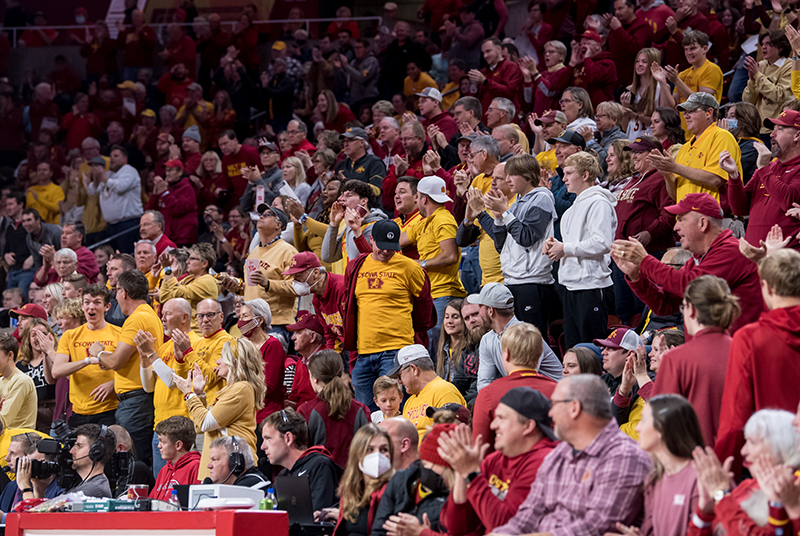 Fans cheer in a full Hilton Coliseum