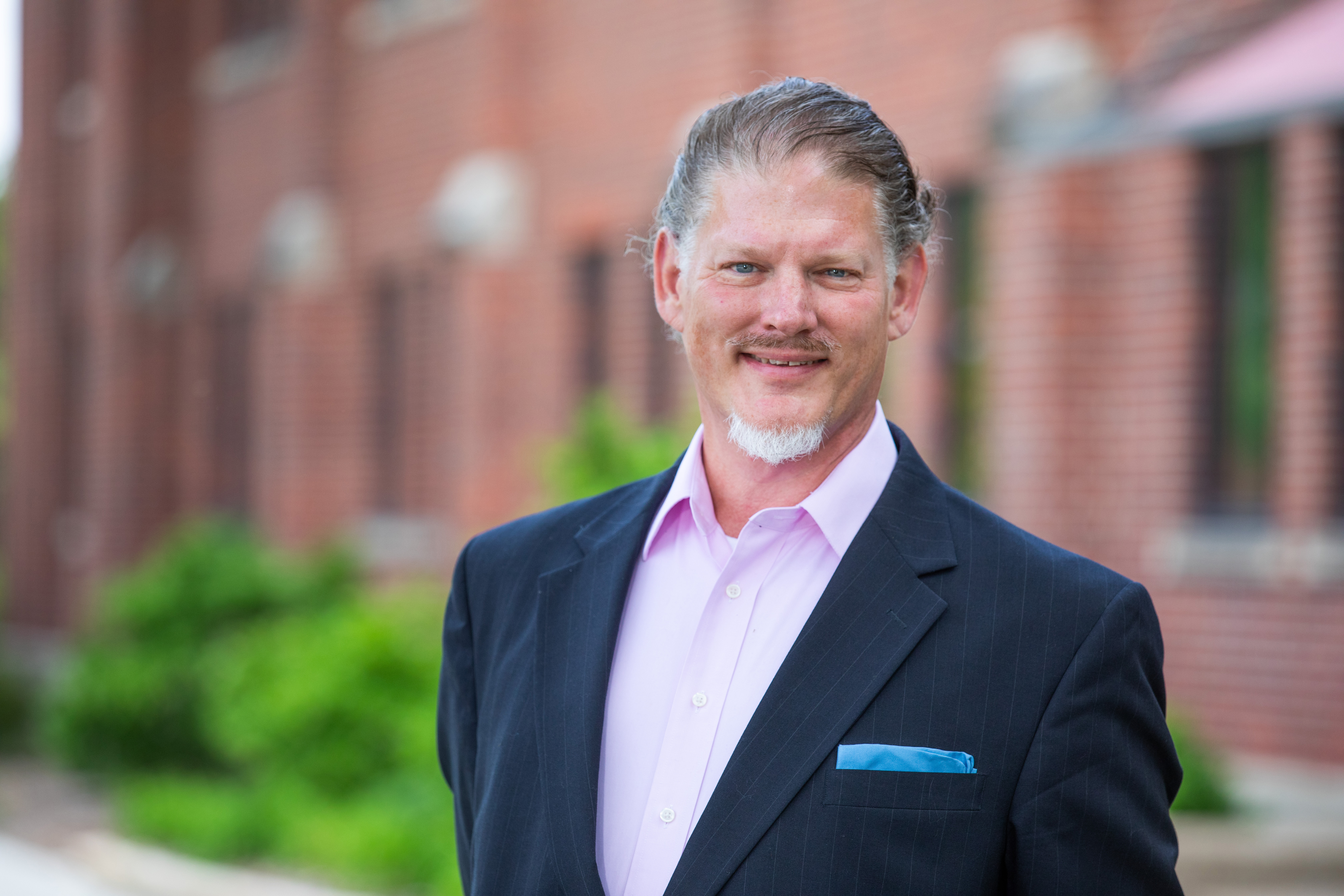 Steve Kohtz wearing a blue suit