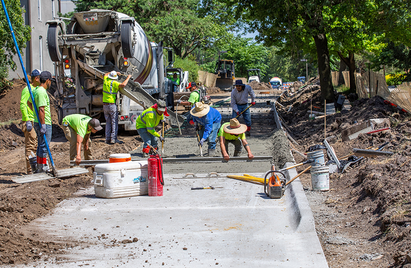 Concrete crew pours a section of Farm House Lane.