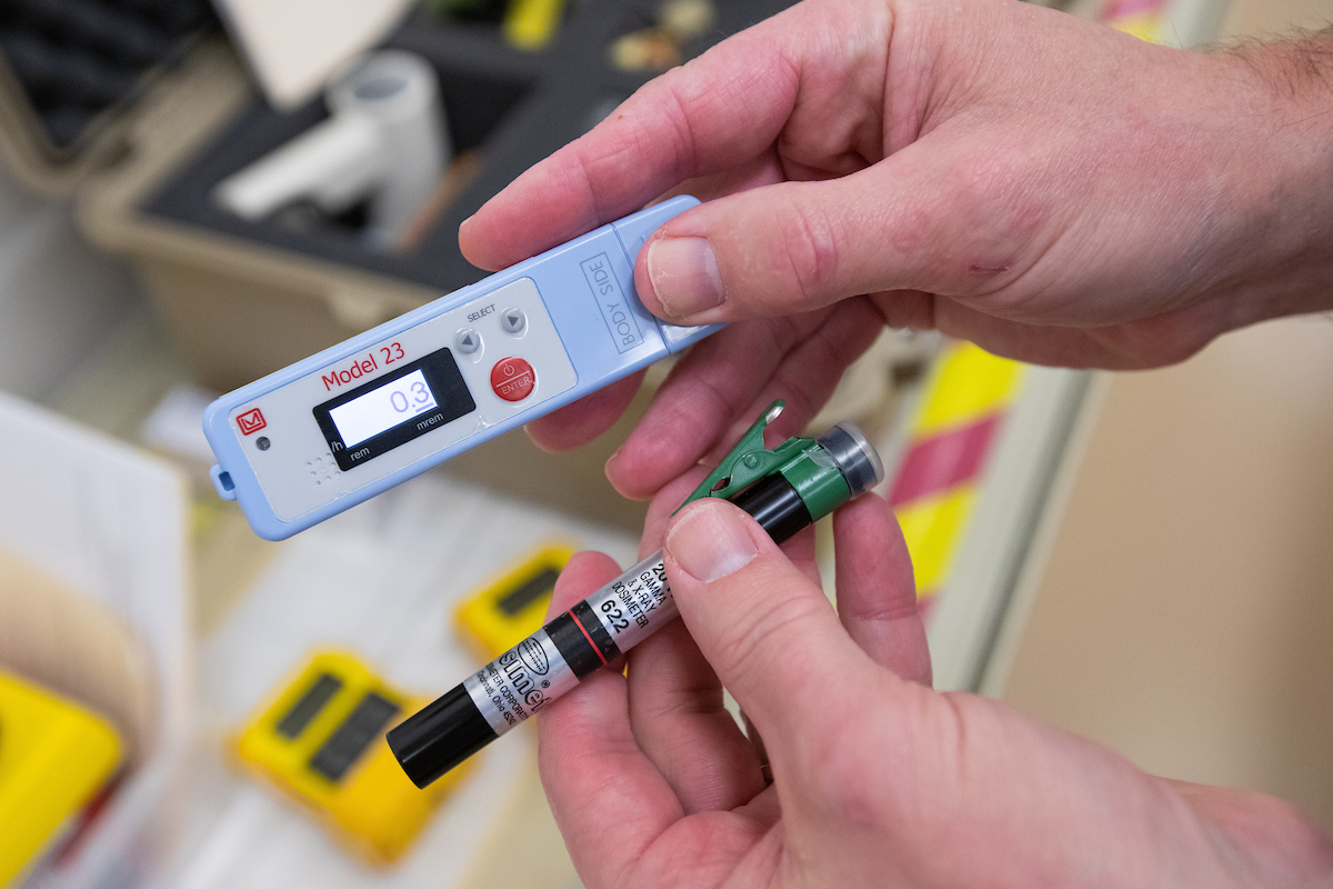 Scott Wendt with new and old radiation meters