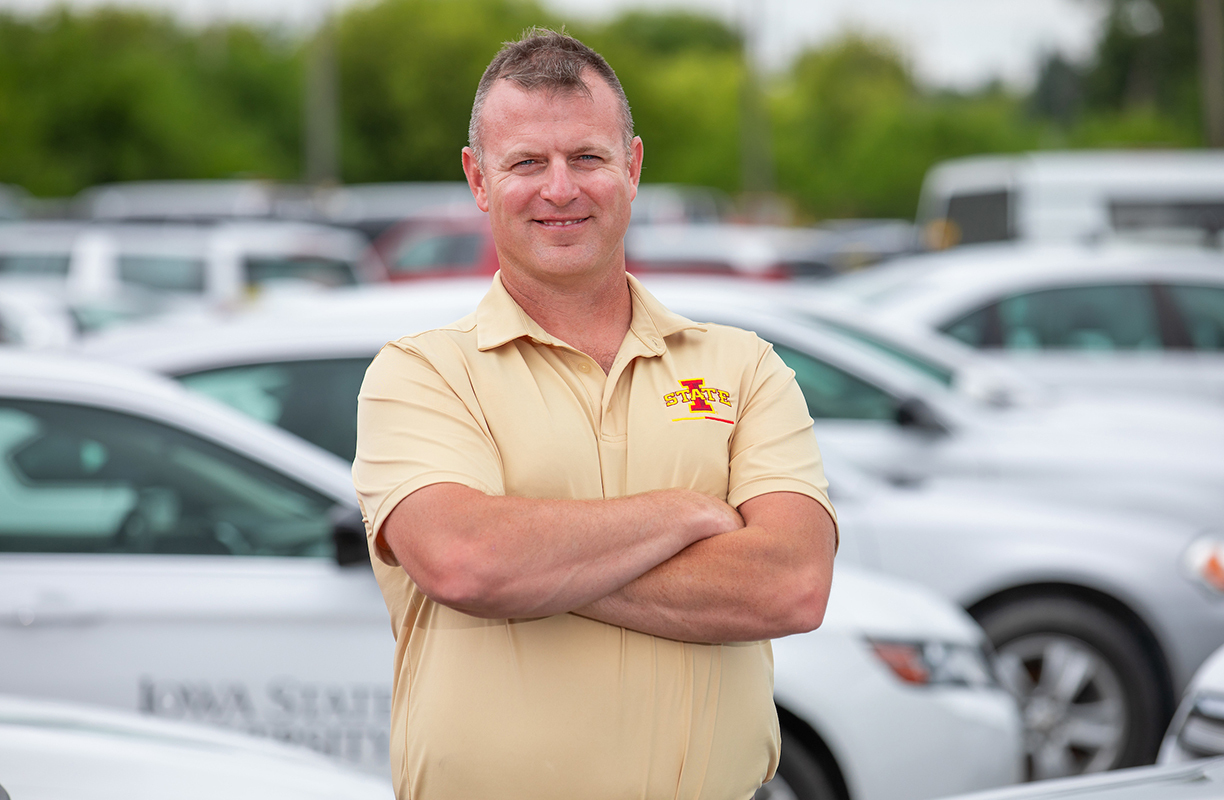 Transportation services director Jeremy Paul next to fleet